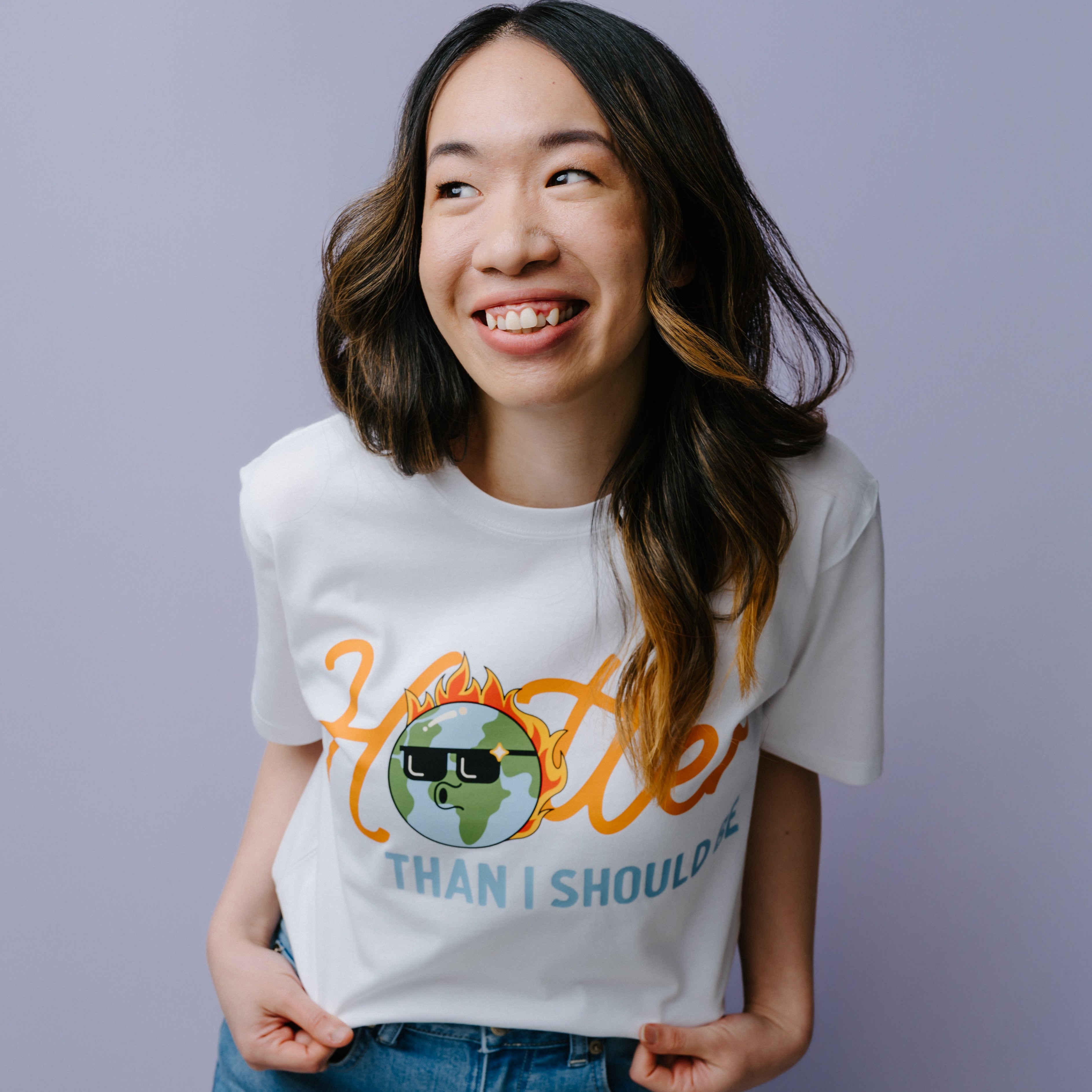 Person wearing a white t-shirt with text, Hooter Than I Should Be" and graphics on a plain background. WWF-Australia T-Shirt.