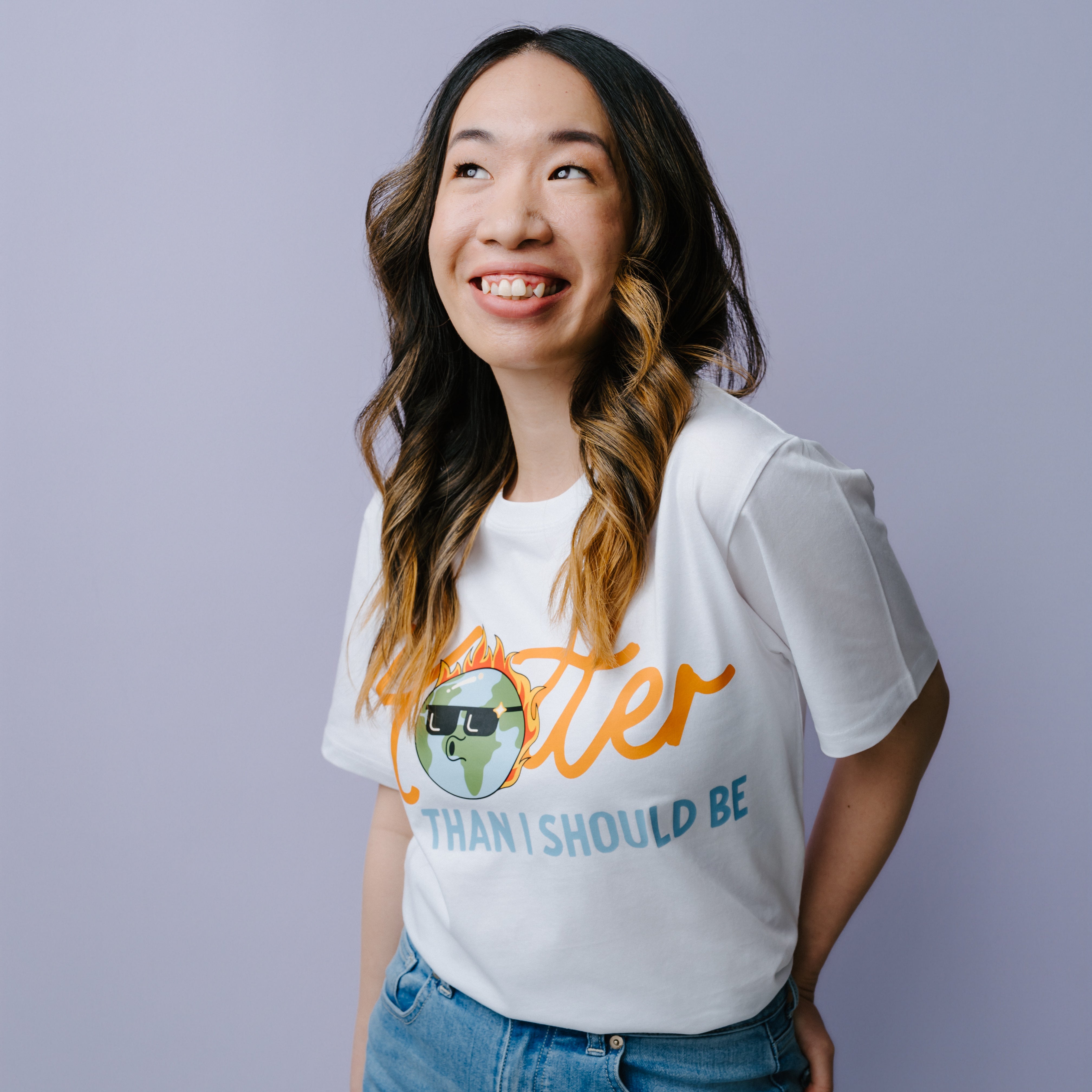 Woman wearing a white t-shirt with text, Hooter Than I Should Be" and graphics on a plain background. WWF-Australia T-Shirt.
